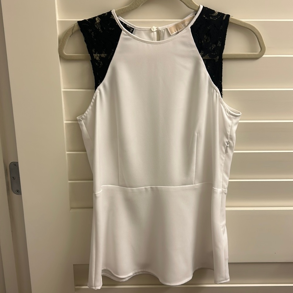 Michael Kors size 0 white fit and flare sleeveless top with black lace shoulders